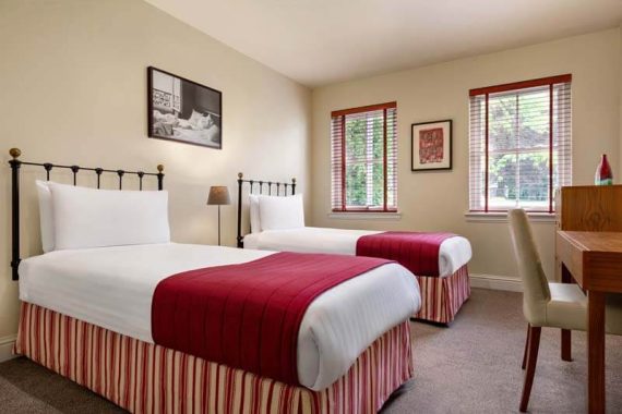 Twin beds in 2 Bedroom Lodge at Duchally Hotel & Country Estate