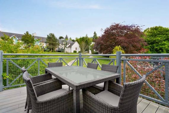 Terrace with garden view in 3 Bedroom Lodge at Wyndham Duchally