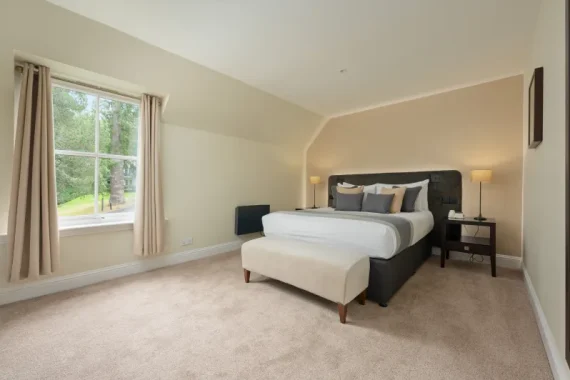 Wyndham Duchally Superior 2 bedroom lodge master bedroom with garden view